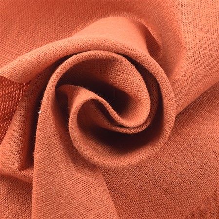 Medeltjockt orange linnetyg till sömnad av kläder