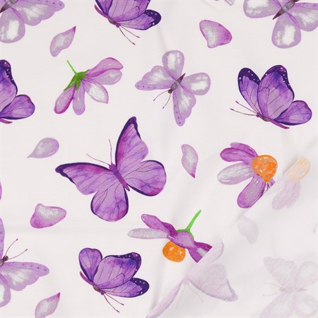 bomullsjersey lila fjärilar på vit botten